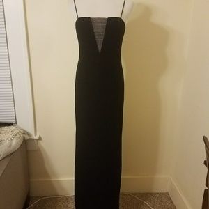 Black velvet prom dress with beaded deep V